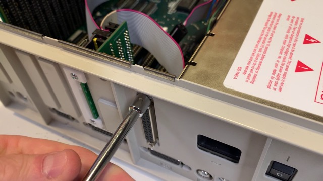 Reinstall DB-25 connector in IIgs rear slot