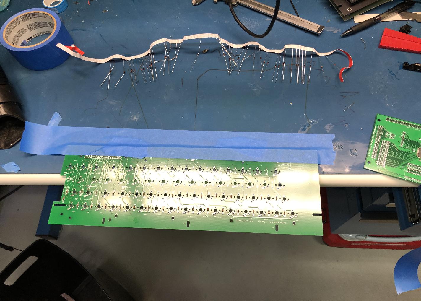 Secure the PCB with space for the leads